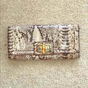 snakeskin clutch